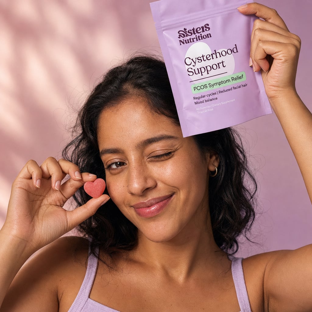 Woman smiling with Cysterhood Support pouch